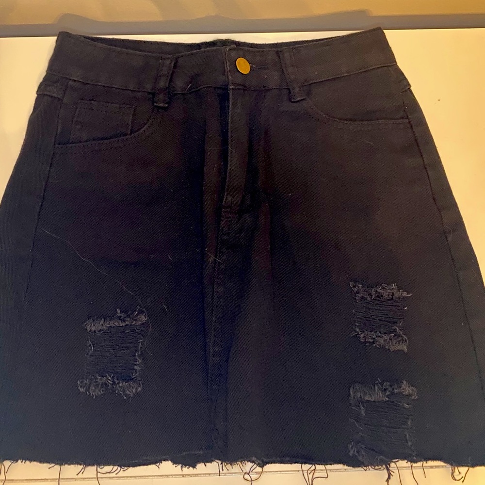 Black, ripped denim skirt